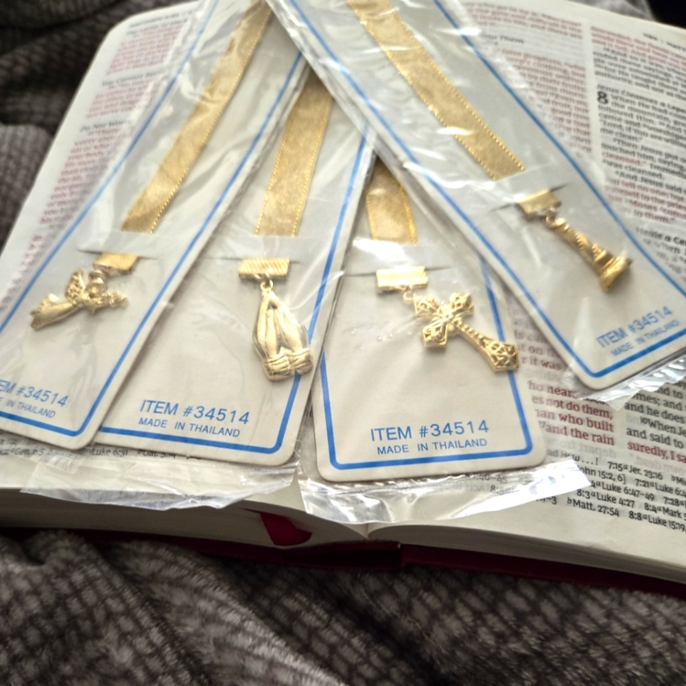 Gold-Plated Christian Bookmarks four faith-inspiring designs.